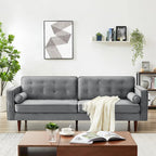 Pohodlná sametová pohovka s knoflíkovým prošíváním v moderním stylu poloviny století