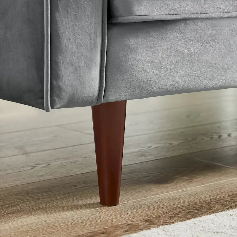 Pohodlná sametová pohovka s knoflíkovým prošíváním v moderním stylu poloviny století