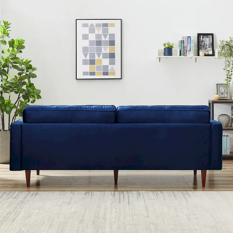 Pohodlná sametová pohovka s knoflíkovým prošíváním v moderním stylu poloviny století