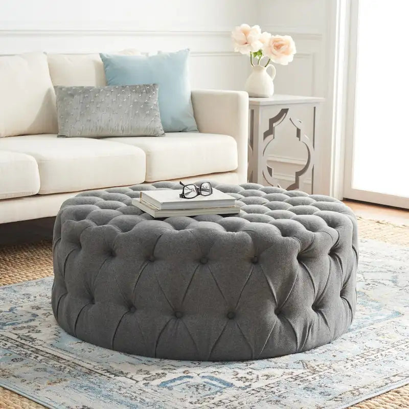 Pouf rotondo in lino capitonné con bottoni